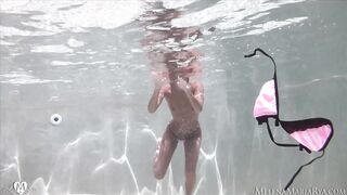 Underwater erotic fingering