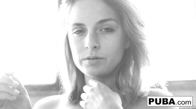 Busty Ashlee Graham smokes while showing off her natural tits