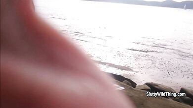 Playing with pussy at beach