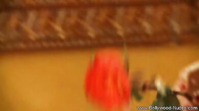 A daring Indian Lady dancing in a seductive way