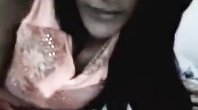 Webcam solo with an Indian chick flashing her tits