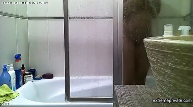 Curvy indian stepmom spied in the shower