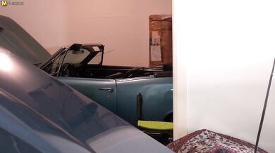 Naughty mature female mechanic getting greasy in her garage