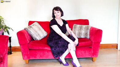 Big breasted British temptress playing with her pussy