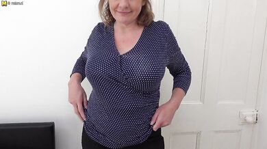 Naughty big breasted British housewife playing with her pussy