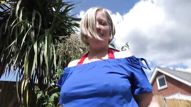 Naughty mature lady playing with herpussy in the garden