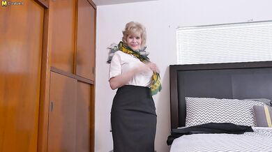 Horny American mature lady playing with her toys