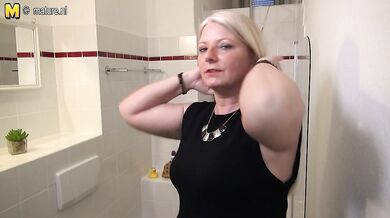 Naughty German housewife playing in her bathroom
