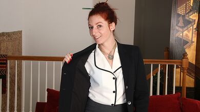 Red Hairy American housewife playing with her muff