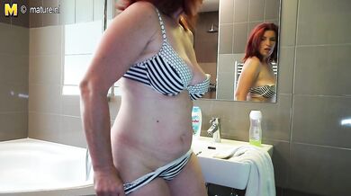 Horny redhead housewife getting herself off