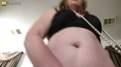 Hot American MILF playing with her shaved pussy
