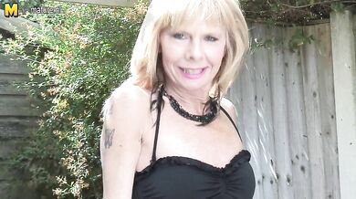 Naughty British housewife taking a dip in the hot tub