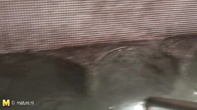 Mature women relaxing in a sauna