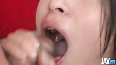 Two horny guys surround gorgeous Nana Kunimi feeding her dicks for dinner.