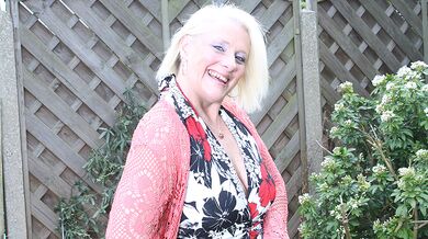Naughty British housewife playing in the garden