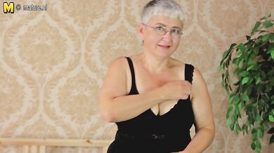 Naughty mature slut teasing herself with her toy