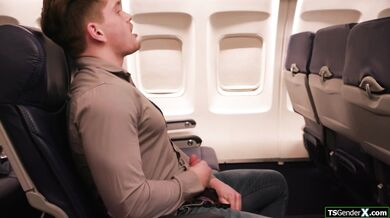 Busty shemale flight attendant Ariel Demure fucks passengers