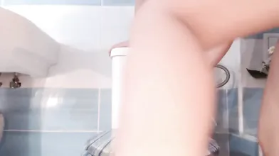 Busty Babe fucks a dildo in the bathroom