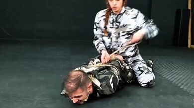 BondageKitties - (Spanish) - Military Man Hogtied And