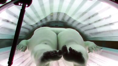 Busty and husky brunette in solarium