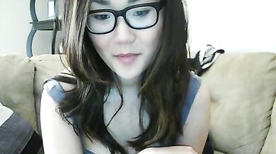 Asian Webcam Slut Strips and Rubs Her Pussy