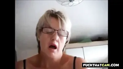 Busty Amateur MILF Gives a Handjob on Webcam