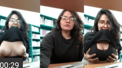 Vintage viral busty Desi girl in library pulls shirt up to