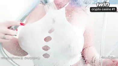 Sexy latina teasing in the shower ample booty and immense mounds against the gla