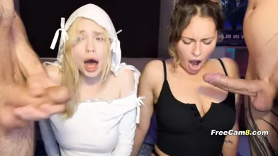 Two Slutty Babes Sucking Cock Side by Side