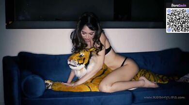 Petite nymph adult on a blue sofa wants to cum