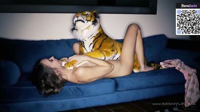 Petite nymph adult on a blue sofa wants to cum
