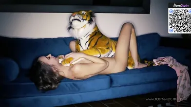 Petite nymph adult on a blue sofa wants to cum