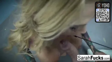 Tattooed blonde with a gigantic arse gives Point of view blowjob