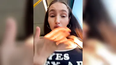 Brunette Woman Shows Natural Assets in Train Car - Yes They Are Real