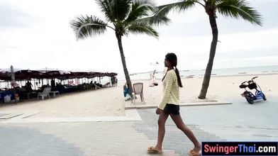 Cute Thai teen amateur takes a big white cock in her petite pussy