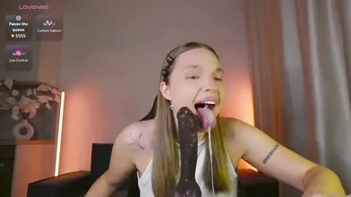 Brunette Teen Deepthroats Massive Black Dildo Live on Stream