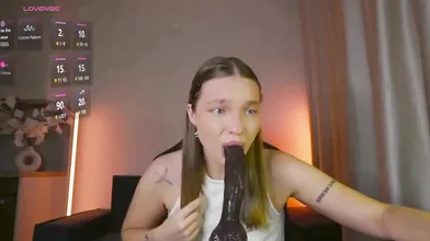 Brunette Teen Deepthroats Massive Black Dildo Live on Stream