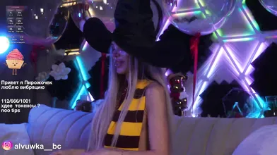 Sexy Blonde in Witch Hat at Neon Party - Cosplay Halloween Vibes