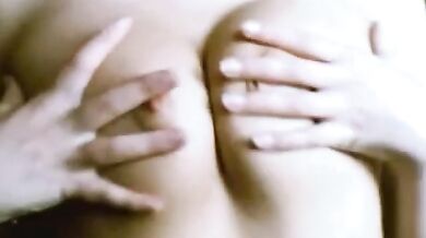 Girlfriend rubs her natural small tits with oil