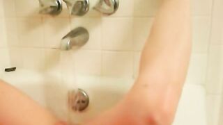 Shy girl next door masturbating in bathtub
