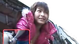 Ride through the city with her face out of the window and her cunt getting teased in the car