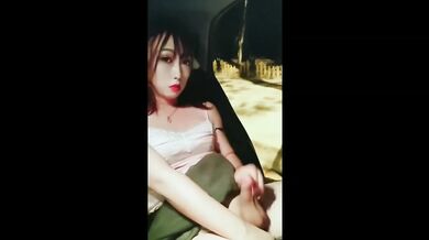 Asian Pi Ladyboy masturbating and cumming inside the car