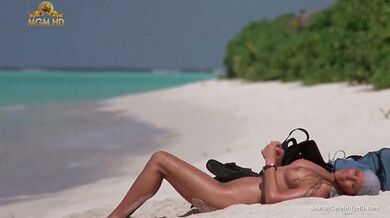 Beautiful Bo Derek showing off her hairy pussy at the beach