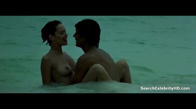 Sylvia Kristel at the beach giving head