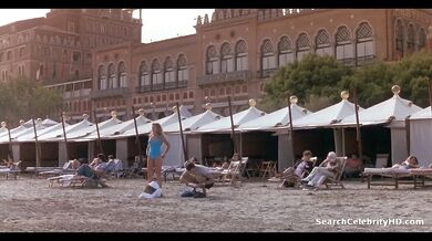 Naughty Natasha Richardson kissing at the beach
