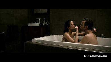 Black haired Eva Green has great boobies for you to see